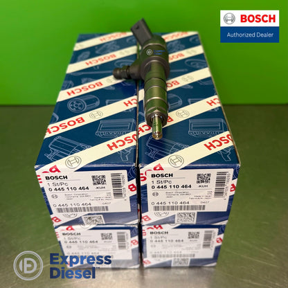 Bosch 0445110464 CRI2-16 injector set of 4 with one injector nozzle tip shown on stacked original Bosch boxes, Yanmar 129A01-53100
