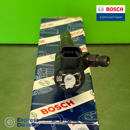 Detail view of Bosch 0445110558 CRI2-16 injector showing laser-engraved part number, inlet port and Bosch QR code 04123831