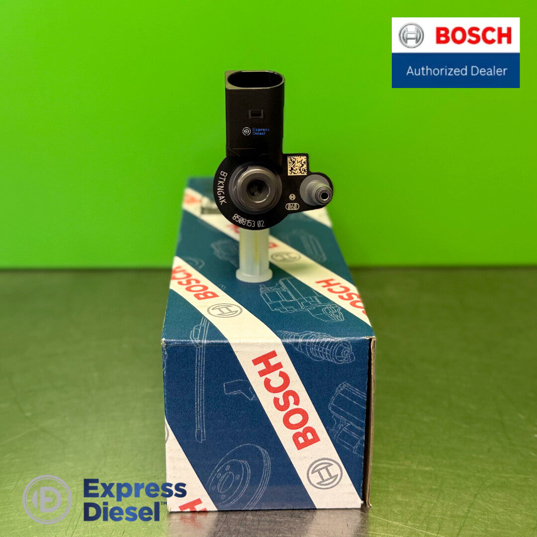 Bosch 0445118035 piezo injector - top view of high-pressure inlet, leak-off return connector and electrical plug