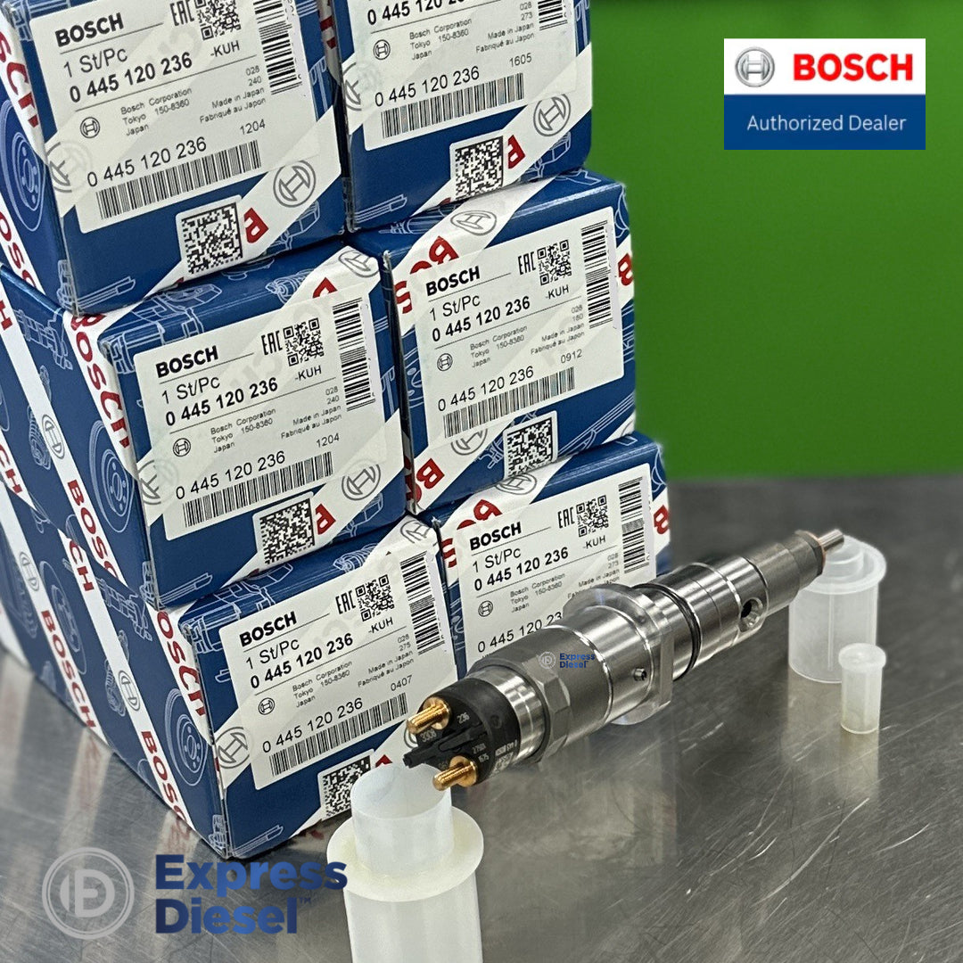 Six Bosch 0445120236 injectors in original Bosch OEM boxes with one injector shown