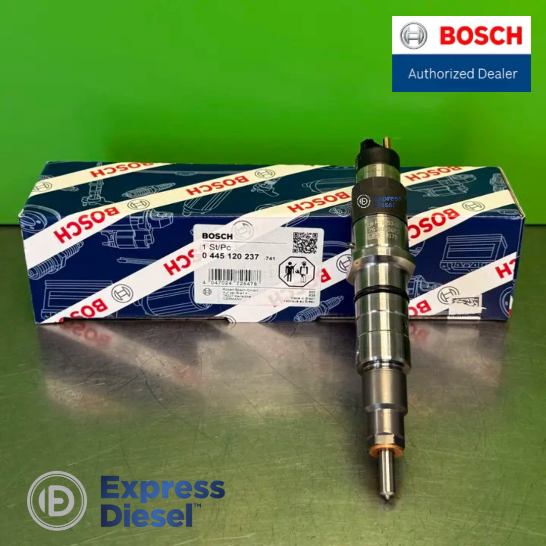 Bosch 0445120237 common rail injector - side view next to the Bosch box